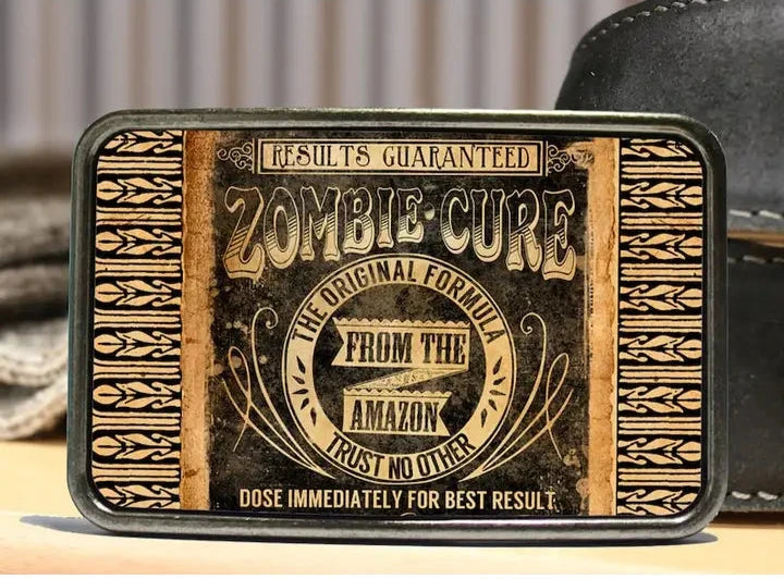The Zombie Cure is one of most unique belt buckles that are completely metal (image area too) and are made to be durable and lasting! Lots of details in the image and slightly smaller than most of our buckle selection. Available at our Smyrna, TN shop a short ride from downtown Nashville.
Belt Buckle Measures: -3"x2"
Fits any snap belt up to 1 1/2"
Listing is for the belt buckle only & does not include a belt strap.