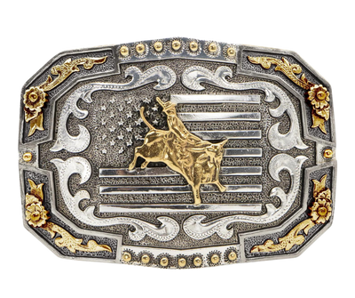 This stylish, oval-shaped buckle features an all-American designs of bullriding motif and a bold USA flag background. It has an antique silver finish with gold accents, giving it a handmade look. Measuring 2 3/4" in height by 3 3/4" in width, it is suitable for belts up to 1 1/2" wide. You can buy it online or in our Smyrna, TN store near Nashville. Proudly made in Mexico.
