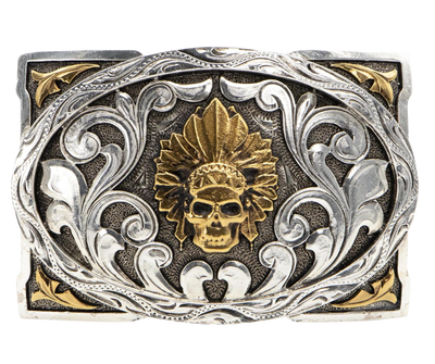 This belt buckle blends Indian symbolism and classic Western scrollwork in antique silver and gold plating, giving it a timeless appeal. With a height of 2 5/8" and width of 4", it fits belts up to 1 1/2" wide and is available for purchase online or at our Smyrna, TN shop near Nashville. Made in Mexico.