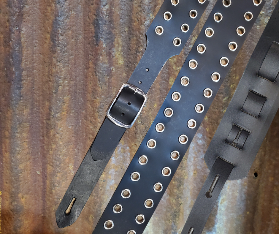 Studs and Eyelets like Marshalls have have been staple for years in Rock music!  "This 2" wide Guitar Strap is a nod to that classic influence. It's made from Pebbled Veg-Tan Cowhide and after some gig's it'll look like you bought in a Vintage shop. The classic adjustment style goes from approx. 42" to 56" at it's longest . Made just outside Nashville in our Smyrna, TN. shop. It will need a bit of time to "break in" but will get a great patina over time.
