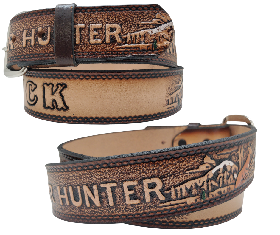 This Buck Fever all leather Name belt features a Deer Hunting pattern in an antiqued finish with a 1 1/2" width. It is crafted from full grain veg-tanned cowhide, with smooth burnished painted edges and a nickel-plated buckle. For customizing, simply type your desired name or No Name in the "Type Name Here" section, the buckle can be easily interchanged as well. This product is in stock at our Smyrna, TN shop.
