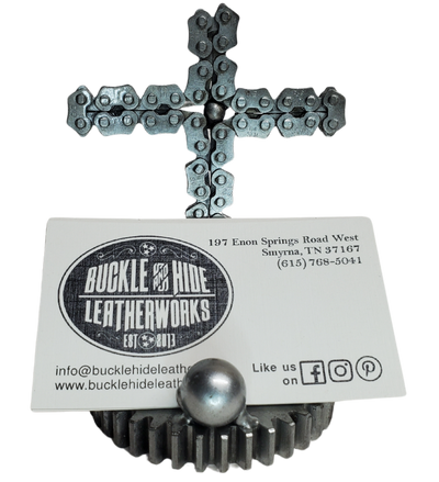 Looking for a unique way to enhance your office? Consider this one-of-a-kind metal art Business Card holder! It's the perfect gift for any Christian or Jesus Follower! Each piece is hand-crafted using sprockets, chains, nuts, bolts, washers, springs, and bearing wheels, making it a truly one-of-a-kind present. For exact measurements, check out the photo. You can find these METAL artwork pieces at our Smyrna store, located just minutes from Nashville, TN.