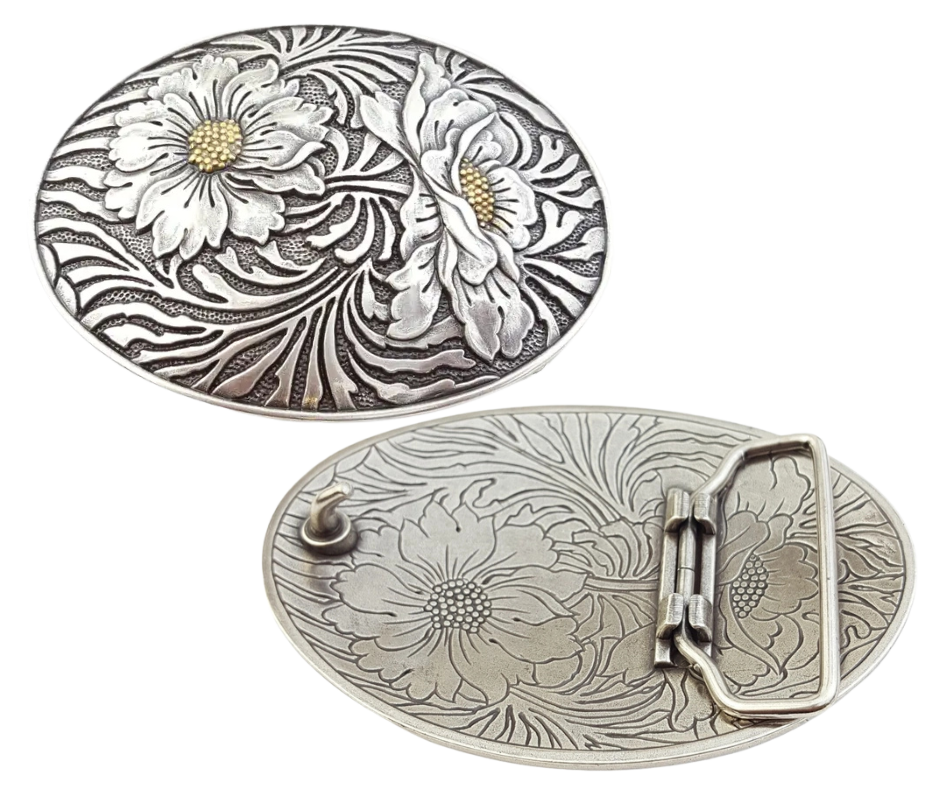 The "Sunshine" buckle features an oval design adorned with charming western-style flowers. It fits a standard 1 1/2" belt and showcases a dark antique and silver finish, with golden highlights at the heart of each flower. Measuring about 2 1/2" by 3 3/4", this buckle brings a sunny touch to your outfit. Grab yours online or visit us in Smyrna, TN, just a stone’s throw from Nashville!