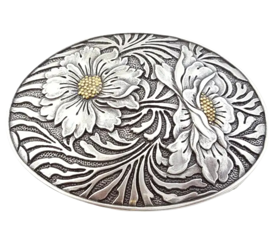 The "Sunshine" buckle features an oval design adorned with charming western-style flowers. It fits a standard 1 1/2" belt and showcases a dark antique and silver finish, with golden highlights at the heart of each flower. Measuring about 2 1/2" by 3 3/4", this buckle brings a sunny touch to your outfit. Grab yours online or visit us in Smyrna, TN, just a stone’s throw from Nashville!