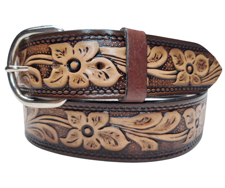 This Dogwood leather belt features Dogwood Blooms in an antiqued Brown finish with a 1 1/2" width. It is crafted from full grain veg-tanned cowhide, with smooth burnished painted edges and a nickel-plated buckle. The buckle can be easily interchanged as well. This product is in stock at our Smyrna, TN shop.