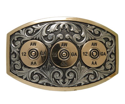 The Front seat buckle has a classic shape with a Western scroll design, a beaded edge framing Shotgun Shells. This buckle is made from 100% pure German silver (nickel and brass alloy) or iron metal base. This product is handcrafted. Each piece is punched, cut, soldered, engraved, and polished. Buckle size is 3" H x 3 7/8" W”&nbsp;and fits belts up 1 3/4" wide a little bigger than some of our other buckles that is available in our Smyrna, TN shop not far from Nashville.