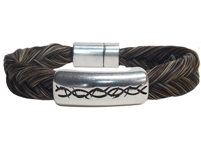 Discover the timeless charm of Barb Wire and Braided Horsehair in our classic Western style bracelet. Each piece features a strong magnetic clasp for durability. To ensure a comfortable fit, wear it snug or even take it in the water - just be sure to remove it before swimming or showering. You can find this unique bracelet at our shop in Smyrna, TN, conveniently located just a short drive away on I-24. Handcrafted in Montana with horsehair primarily sourced from Argentina, Mongolia, and Canada.
