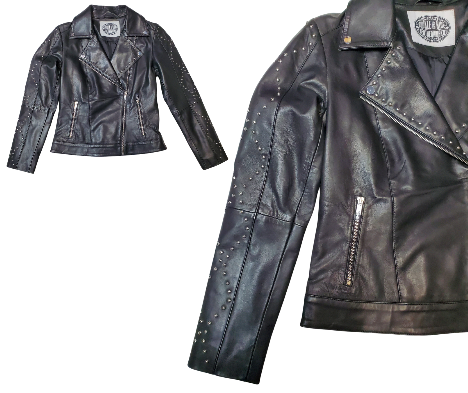 This Studded Black MC Zip front Lamb skin jacket is soft and supple a update of a timeless classic, it features black lining, antique silver hardware, and 3 outside pockets and two inside pockets. Bring your inner rocker! You can find it near Nashville, in Smyrna, TN. Sizes XS-5XL Call for size availability.
