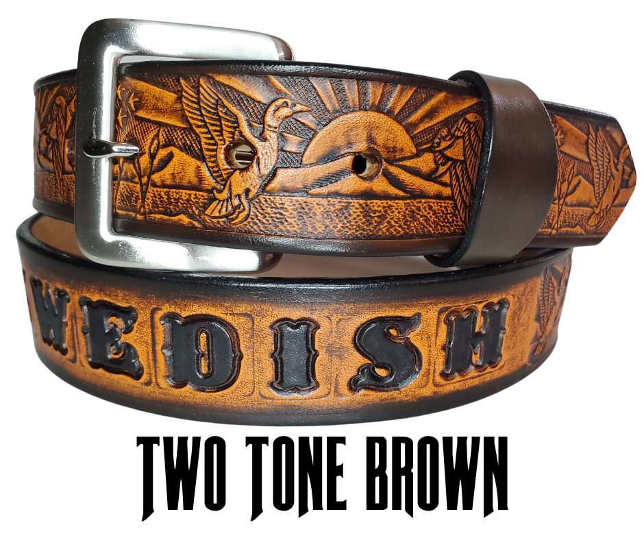 This solid strip of Veg Tan cowhide, is hand stained in 4 brown options, with smooth, finished edges. Embossed with a Mallard Duck scene down length of belt, or have name added to scene up to 8 letters. Belt thickness is approx. 1/8", and 1 1/2" wide. Sizes available are 34" to 44" from buckle end to hole most worn. Attached with 2 snaps is a Brushed Nickel plated solid brass buckle. 