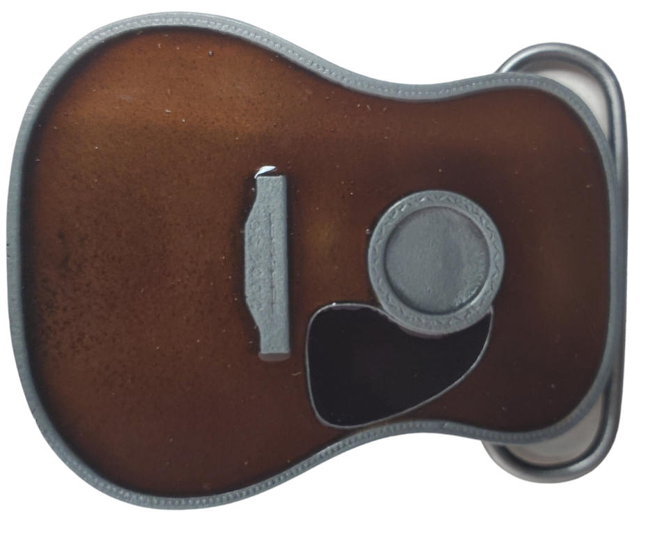 Strut your style with the iconic "Martin" Belt Buckle! This 2 1/2" tall by 3 1/2" wide buckle is fit for all music genres, from Rock to Bluegrass, Jazz to Folk. Let the world know your passion for playing guitar! Just outside of Nashville, home of the Acoustic Guitar, you can find the belt buckle in our Smyrna, TN shop online.