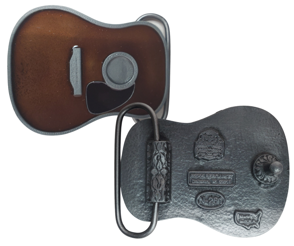 Strut your style with the iconic "Martin" Belt Buckle! This 2 1/2" tall by 3 1/2" wide buckle is fit for all music genres, from Rock to Bluegrass, Jazz to Folk. Let the world know your passion for playing guitar! Just outside of Nashville, home of the Acoustic Guitar, you can find the belt buckle in our Smyrna, TN shop online.