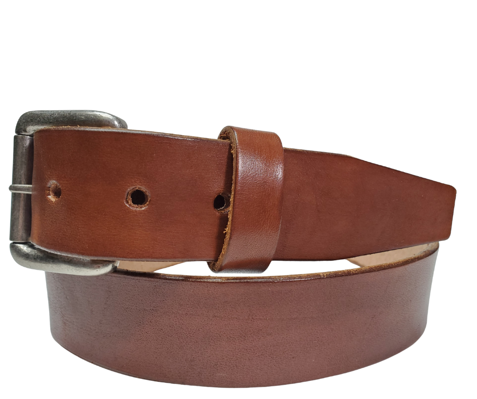 Medium Brown
Great for The Office! This real Veg-Tan leather belt starts with a hand dyed 9-10oz (1/8"ish) leather belt strip. Comes with your choice of Antique Nickle or Brass colored buckle that is snapped in for easy removal. It is handmade in our Smyrna, TN shop, which is located just outside of Nashville.