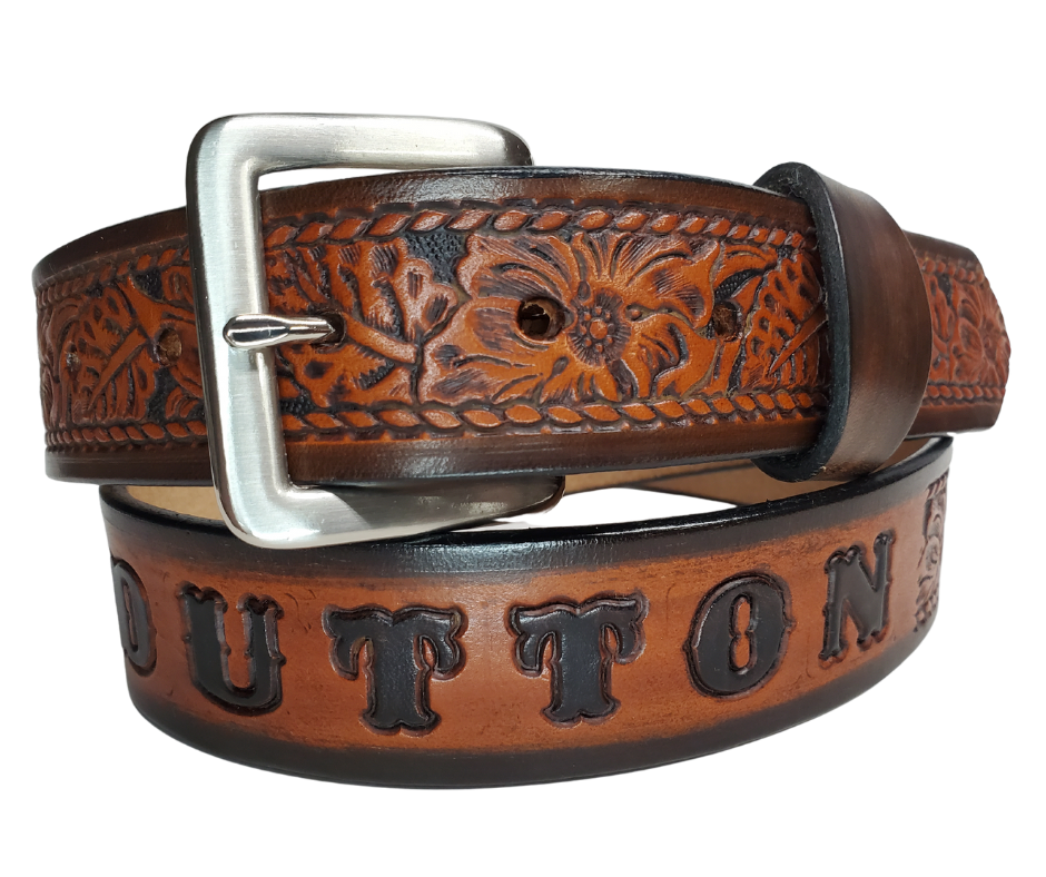 This personalized Vegtan leather belt, aptly named "The Ranch," with it's Western scroll pattern framed in a Rope edge border. Made in Smyrna, TN, close to Nashville. It's interchangeable solid brass buckle ensures convenience while maintaining high quality. Elevate any outfit with this stylish and versatile accessory.