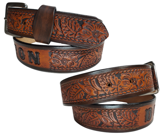 This personalized Vegtan leather belt, aptly named "The Ranch," with it's Western scroll pattern framed in a Rope edge border. Made in Smyrna, TN, close to Nashville. It's interchangeable solid brass buckle ensures convenience while maintaining high quality. Elevate any outfit with this stylish and versatile accessory.