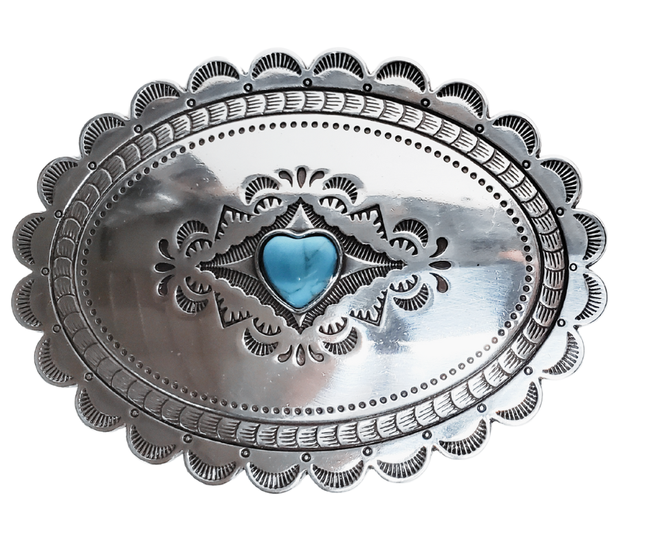 A southwest classic style oval Concho design that has a hand stamped appearance. The scalloped edge border sets it off around the edge. It is Antique silver in it's finish with a Small Heart shaped Turquoise colored stone in the center. with scroll design etched appearance on surface.  Measures approx. 3" tall by 4" wide and fits belts up to 1 1/2" wide.  It is available for purchase in our retail shop in Smyrna, TN, just outside Nashville and also on the online store. 