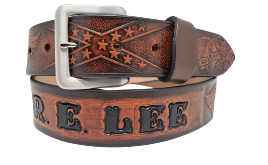 This Name Belt is one-of-a-kind Hand stained strip of vegetable tanned leather showcasing a Southern Heritage Eagles and Stars and Bars style pattern. Plus, the solid brass buckle in antique nickel finish can be easily switched out. Each belt is handcrafted at our shop in Smyrna, Tennessee, close to Nashville.