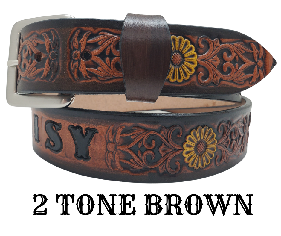 "The Sun Daisy" is a handmade real VEGTAN belt made from a single strip of cowhide shoulder leather that is 8-10 oz. or approx. 1/8" thick. It has hand burnished (smoothed) edges and Summer flowers embossed on the surface with HAND PAINTED in White and Yellow or White or Yellow. The antique nickel plated solid brass buckle is snapped in place with heavy snaps.  This belt is made just outside Nashville in Smyrna, TN.