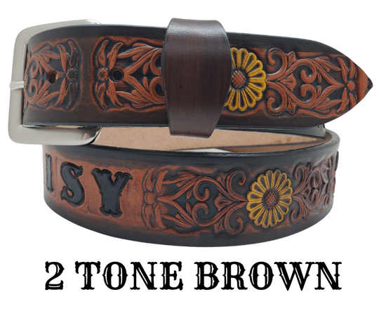 "The Sun Daisy" is a handmade real VEGTAN belt made from a single strip of cowhide shoulder leather that is 8-10 oz. or approx. 1/8" thick. It has hand burnished (smoothed) edges and Summer flowers embossed on the surface with HAND PAINTED in White and Yellow or White or Yellow. The antique nickel plated solid brass buckle is snapped in place with heavy snaps.  This belt is made just outside Nashville in Smyrna, TN.
