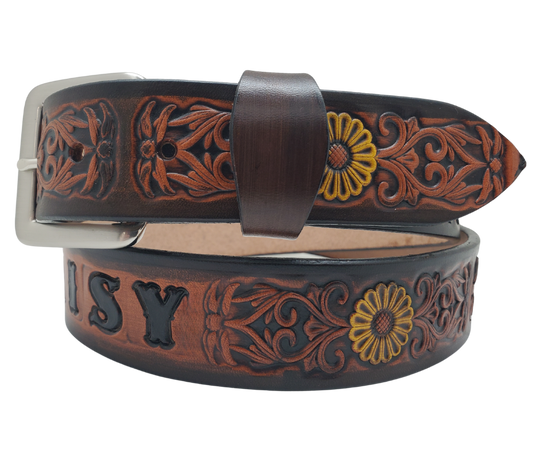 "The Sun Daisy" is a handmade real VEGTAN belt made from a single strip of cowhide shoulder leather that is 8-10 oz. or approx. 1/8" thick. It has hand burnished (smoothed) edges and Summer flowers embossed on the surface with HAND PAINTED in White and Yellow or White or Yellow. The antique nickel plated solid brass buckle is snapped in place with heavy snaps.  This belt is made just outside Nashville in Smyrna, TN.