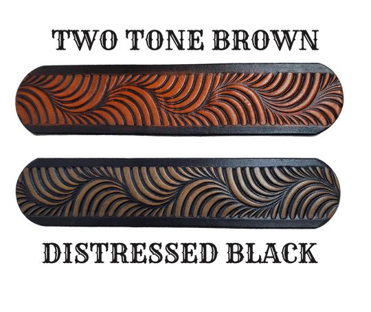 Named after it's swirly pattern it's crafted from full grain American vegetable tanned cowhide, this 1 1/2" belt boasts an antique nickle plated solid brass buckle and smooth, burnished painted edges. Name customization is available with a maximum of 10 letters. The buckle snaps in place for effortless changing if desired. Produced in our Smyrna, TN, USA shop.