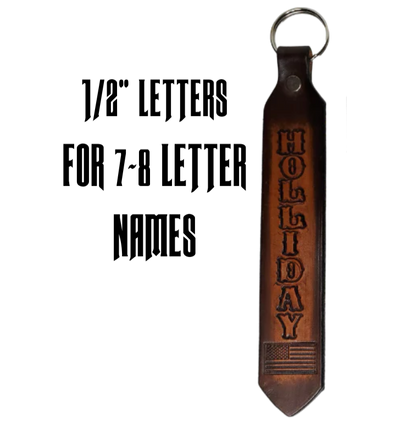 Our Customizable "1975" Longer Leather keychain embossed similar to our popular belts.  Great for identifying luggage, backpacks, or your keys! Available in the below choices All colored in our popular 2 TONE BROWN, pick one or a few. Made in our Smyrna, TN shop. Please type desired name in CUSTOM box.