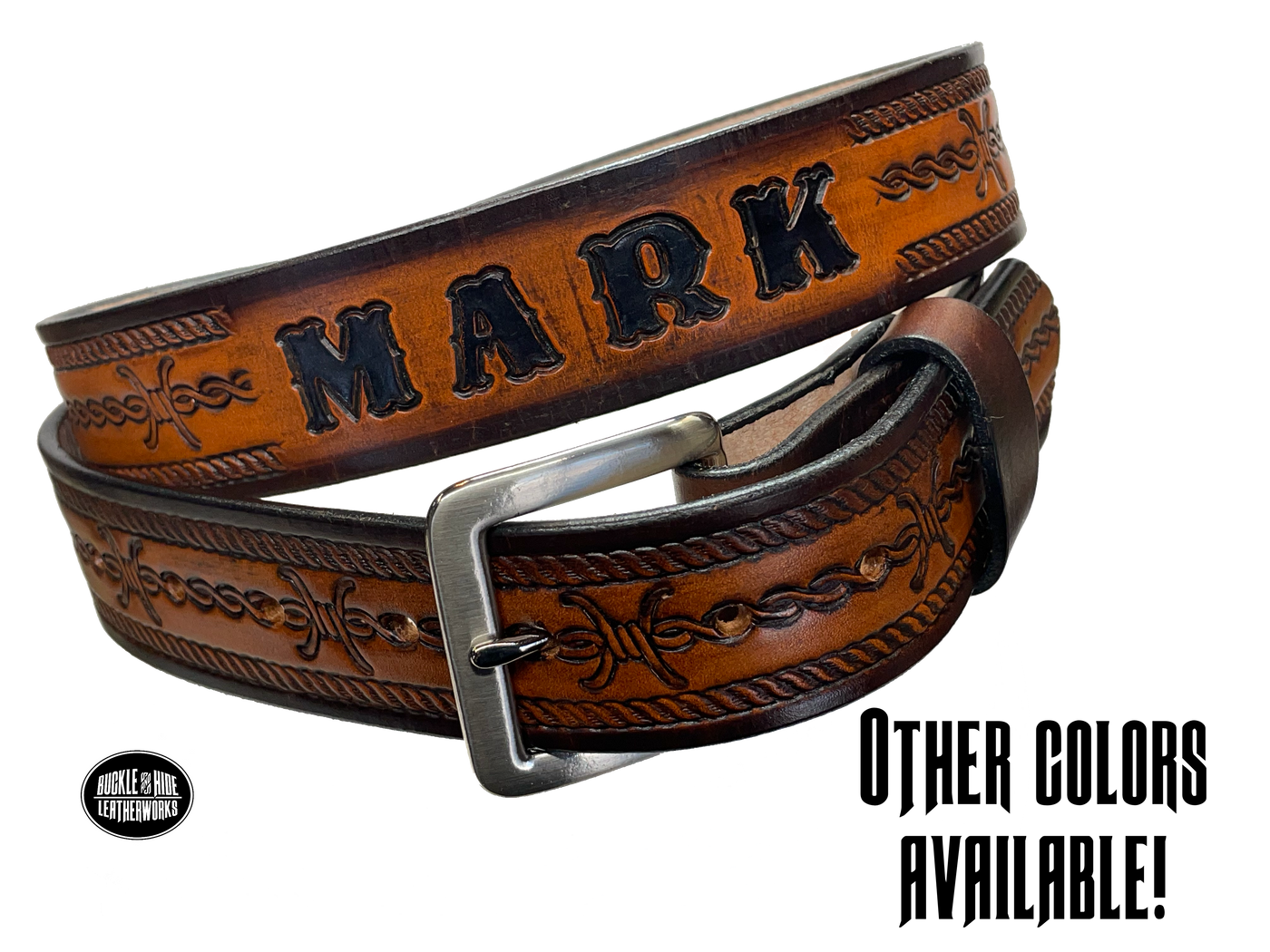Barb Wire a western-inspired twist to any look. Made from premium veg-tan cowhide and featuring a barb wire icon design, the "Riding Fence" Name Leather Belt is the perfect way to add a touch of rustic  to your wardrobe. Hailing from our Smyrna, TN shop just outside of Nashville, TN, this belt also features an easy-to-swap buckle, so you can keep your style fresh. 