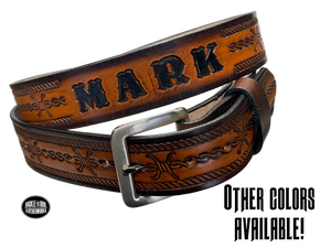 Barb Wire a western-inspired twist to any look. Made from premium veg-tan cowhide and featuring a barb wire icon design, the "Riding Fence" Name Leather Belt is the perfect way to add a touch of rustic  to your wardrobe. Hailing from our Smyrna, TN shop just outside of Nashville, TN, this belt also features an easy-to-swap buckle, so you can keep your style fresh. 