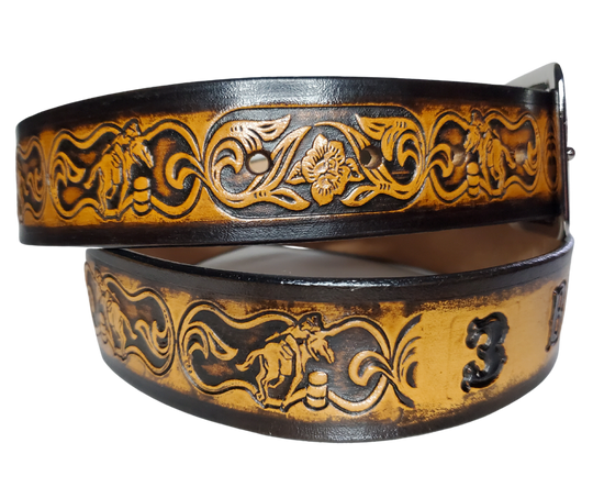 "The Barrel Racer" is a handmade real leather belt made from a single strip of cowhide shoulder leather that is 8-10 oz. or approx. 1/8" thick. It has hand burnished (smoothed) edges and a western influenced Rodeo events pattern. This belt is completely HAND dyed with a multi step finishing technic. The antique nickel plated solid brass buckle is snapped in place with heavy snaps.  This belt is made just outside Nashville in Smyrna, TN.
