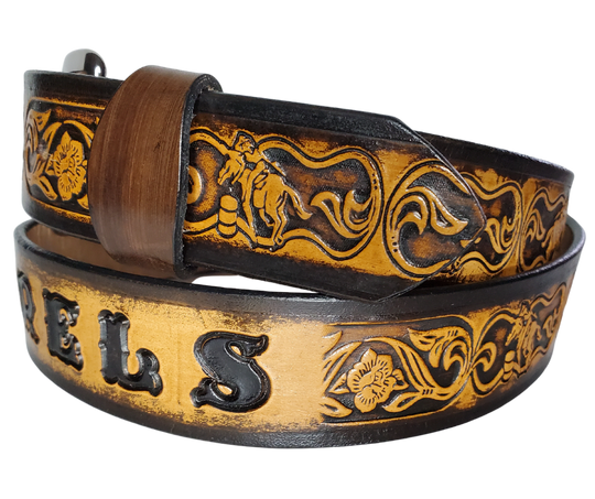 "The Barrel Racer" is a handmade real leather belt made from a single strip of cowhide shoulder leather that is 8-10 oz. or approx. 1/8" thick. It has hand burnished (smoothed) edges and a western influenced Rodeo events pattern. This belt is completely HAND dyed with a multi step finishing technic. The antique nickel plated solid brass buckle is snapped in place with heavy snaps.  This belt is made just outside Nashville in Smyrna, TN.