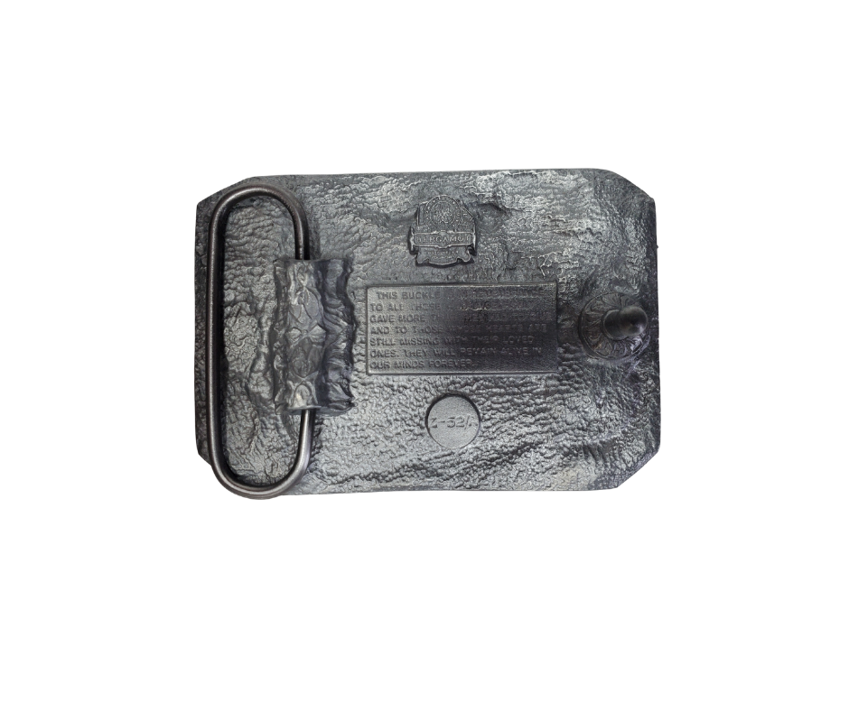 We will never forget! A patriotic POW belt buckle with USA Flags on each side of the well known emblem. Fits up to 1 1/2" belt. Imported. Available online and in our shop in Smyrna, TN, just outside of Nashville.