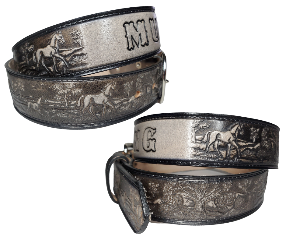 The Wild Horses leather belt is a 3 Horses Pattern in a Two Tone Black color. Perfect the Horse lover in your family. Available in a 1 1/2" width. Full grain vegetable tanned cowhide, Width 1 1/2" and includes Nickle plated  buckle Smooth burnished painted edges. Made in USA! For name Type name desired on belt in "Type Name Here" section, no more than 8 LETTERS maximum on this PARTICULAR belt. Buckle snaps in place for easy changing if desired. In stock at our Smyrna, TN shop.