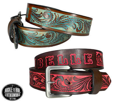 "The Belle Rustler" is a handmade real leather belt made from a single strip of cowhide shoulder leather that is 8-10 oz. or approx. 1/8" thick. It has hand burnished (smoothed) edges and Classic tooled western style flowers embossed and hand colored to look like rustic Brown and Turquoise . The antique nickel plated solid brass buckle is snapped in place with heavy snaps.  This belt is made just outside Nashville in Smyrna, TN. 