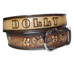 This stylish leather belt features beautiful flowers and butterfly artwork that is sure to draw attention. The easy-change metal buckle makes for comfortable wear and makes it easy to adjust for size. Perfect for adding a unique touch to any wardrobe. This belt is stocked in our shop outside Nashville in Smyrna, TN.