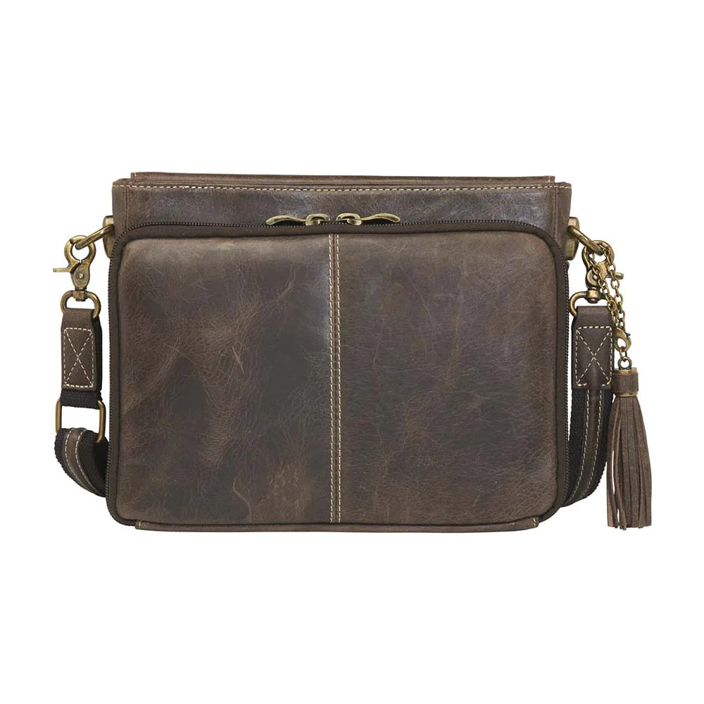 Distressed Vintage Tanned Full Grain Buffalo Leather. The more leather is used, the better it gets! Rich distressed patina comes with age. Wonderfully soft from oils infused in tanning process.  Designed for either Right or Left handed use. Special padding to prevent gun imprinting Slash resistant Shoulder Strap11 ply steel wire tastefully reinforced Cross body length. Easily clips on and off. Width helps disperse bag weight. Adjustable. Includes our Standard Holster 