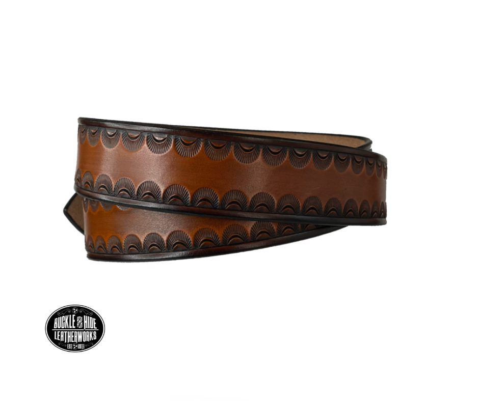 "The Jackson" handmade all leather belt is made from a single strip of Veg-tan cowhide or drum dyed (colored all the way through) Black cowhide shoulder leather.  The Two tone brown is a hand finished Veg-tan that is 9-10 oz., or approx. 1/8" thick.  The width is 1 1/2".   The antique nickel plated solid brass buckle is snapped in place. This belt is made just outside Nashville in Smyrna, TN. Perfect for casual and dress wear, it can be for personal use or for groomsman gifts or other gifts as well.