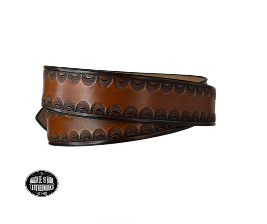 "The Jackson" handmade all leather belt is made from a single strip of Veg-tan cowhide or drum dyed (colored all the way through) Black cowhide shoulder leather.  The Two tone brown is a hand finished Veg-tan that is 9-10 oz., or approx. 1/8" thick.  The width is 1 1/2".   The antique nickel plated solid brass buckle is snapped in place. This belt is made just outside Nashville in Smyrna, TN. Perfect for casual and dress wear, it can be for personal use or for groomsman gifts or other gifts as well.