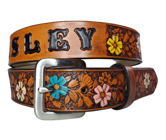 Our "Lil Beulah' is just like the Beulah Land for mom with HAND PAINTED FLOWERS. Full grain American vegetable tanned cowhide approx. 1/8"thick. Width is 1 1/4" and includes Antique Nickle plated Solid Brass buckle. We Hand Finish with a tan center. Edges are smooth burnished painted edges. Made in our Smyrna, TN, USA shop. Buckle snaps in place for easy changing if desired.