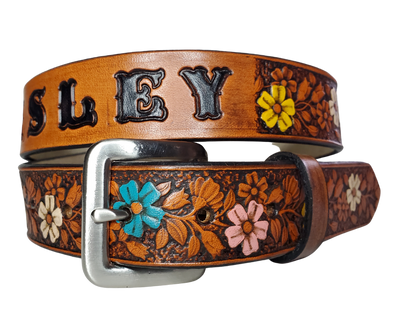 Our "Lil Beulah' is just like the Beulah Land for mom with HAND PAINTED FLOWERS. Full grain American vegetable tanned cowhide approx. 1/8"thick. Width is 1 1/4" and includes Antique Nickle plated Solid Brass buckle. We Hand Finish with a tan center. Edges are smooth burnished painted edges. Made in our Smyrna, TN, USA shop. Buckle snaps in place for easy changing if desired.