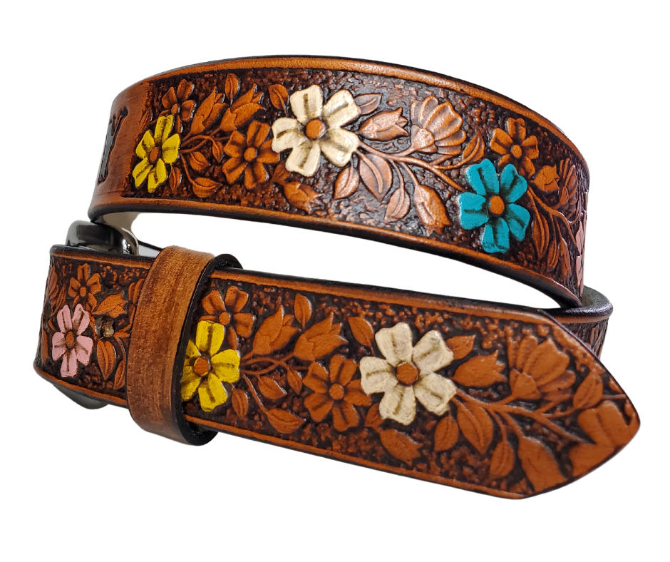 Our "Lil Beulah' is just like the Beulah Land for mom with HAND PAINTED FLOWERS. Full grain American vegetable tanned cowhide approx. 1/8"thick. Width is 1 1/4" and includes Antique Nickle plated Solid Brass buckle. We Hand Finish with a tan center. Edges are smooth burnished painted edges. Made in our Smyrna, TN, USA shop. Buckle snaps in place for easy changing if desired.