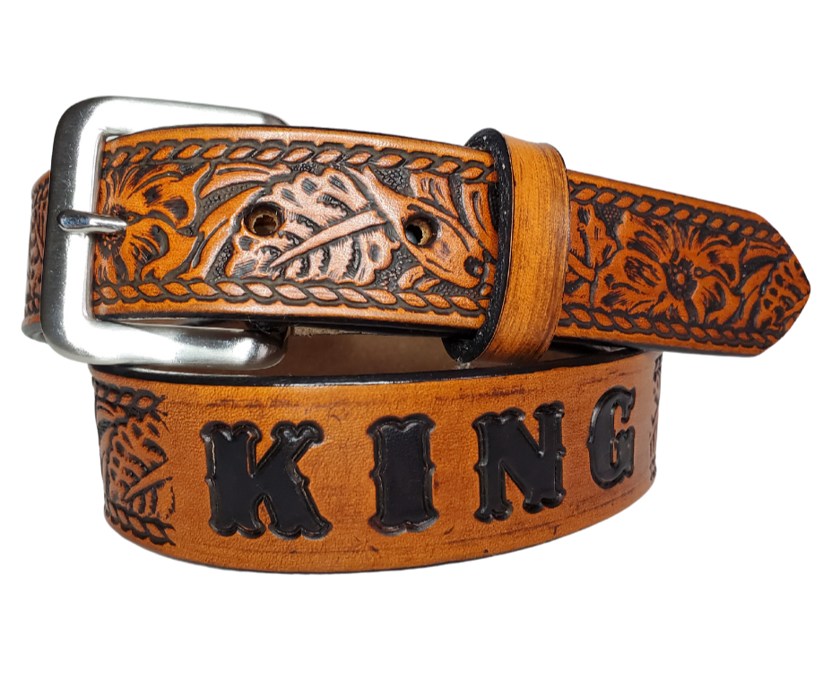 Our Lil Ranch is just like the Ranch for dad or mom. Full grain American vegetable tanned cowhide approx. 1/8"thick. Width is 1 1/4" and includes Antique Nickle plated Solid Brass buckle. We Hand Finished with a darker brown edge feathered into a tan center. Edges are smooth burnished painted edges. Made in our Smyrna, TN, USA shop. Buckle snaps in place for easy changing if desired  Choose with or without name,