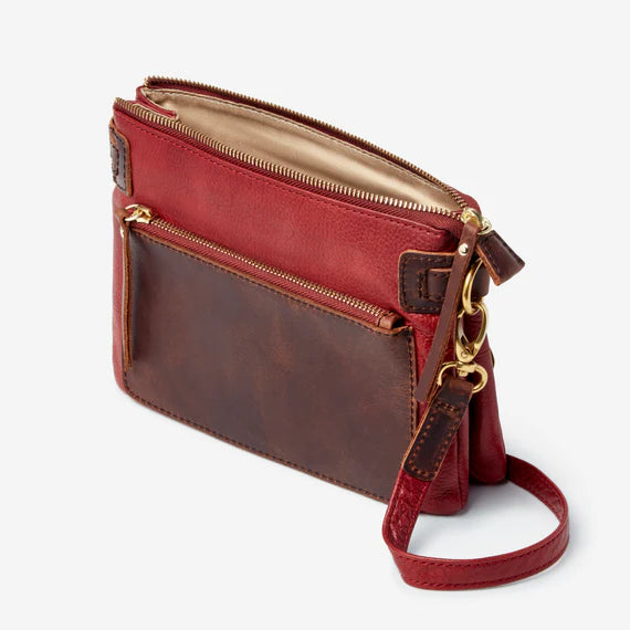 Genuine Cowhide Leather from Argentina. Zip Front pocket, adjustable single strap. Max drop 25"Main zip pocket has open storage, 2 additional compartments for storage, Brass hardware, zippered pocket inside with RFID protection