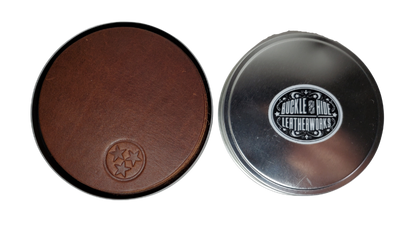 Made in our shop in Smyrna, TN just outside Nashville TN. Real cowhide approx. 3/16"thick in a 3 5/8" diameter coaster.  Embossed with famous Tennessee Tri-Star emblem10 coasters in a tin case. Great for groomsmen gifts, Weddings, Events and more. Contact us for bulk purchases of 50 or 500...