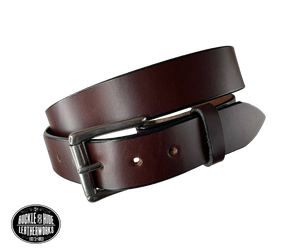 Our handmade, solid, single strip of English Bridle cowhide leather is approx. 1/4" thick and is 1 1/2" wide. Just like our Yuma Extra Wide belt but only 1 1/2" wide, perfect for your casual jeans or khaki's. Heavy duty Stainless Steel roller buckle snaps in place for buckle changing, if desired.  Belt should not roll or bend when carrying. Edges are smoothed and painted. Surface has a satin finish in your choice of black or brown. Made in Smyrna, TN, just outside of Nashville.