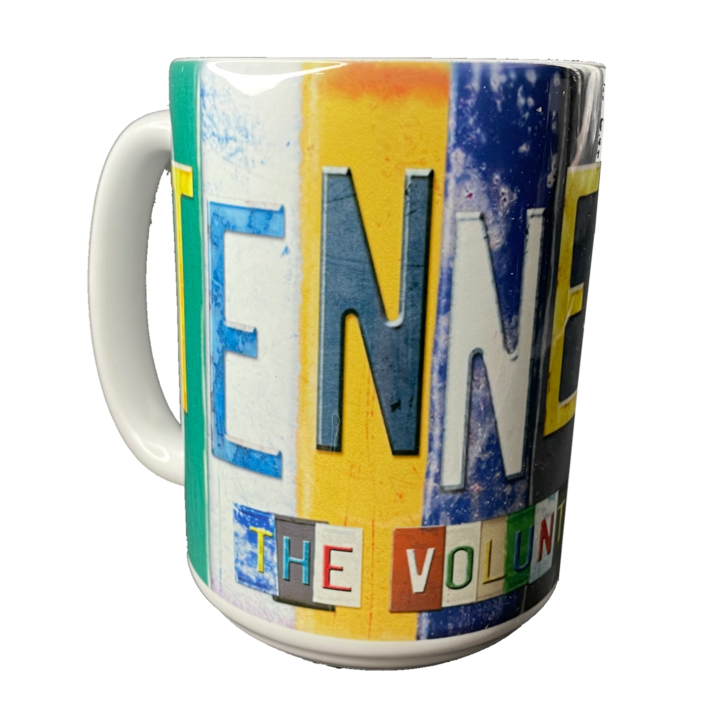 Enjoy your favorite coffee in this Tennessee coffee mug! White ceramic coffee mug with license plate letters spelling out "TENNESSEE".  Available online or in our shop just outside Nashville in Smyrna, TN. 