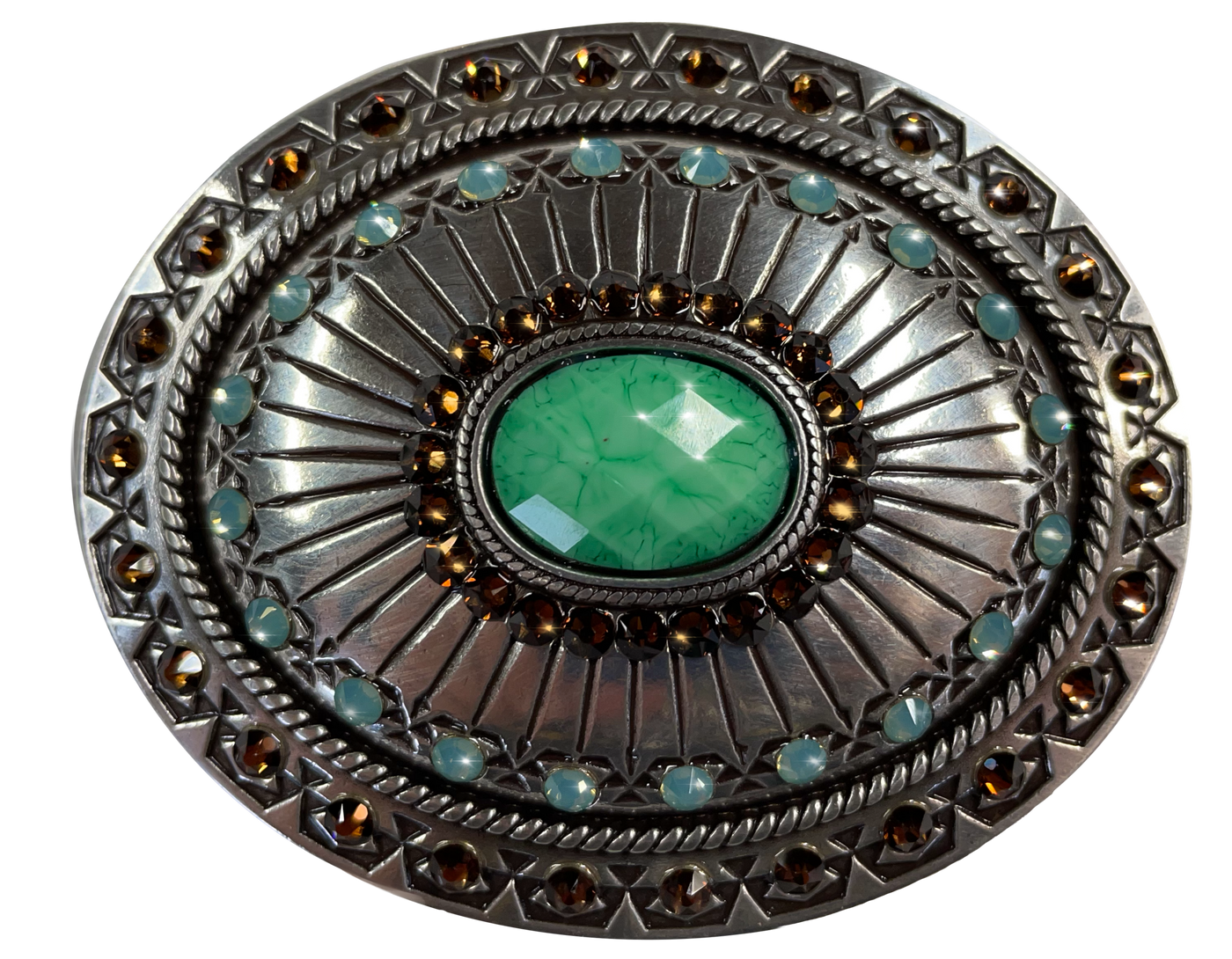 This oval buckle by Nocona's Blazin' Roxx measures 2 1/2" tall by 3" wide. Background color is chrome.  It has a decorative turquoise colored stone in the center surrounded by brown crystals, Lines radiate from the center outward and more turquoise colored crystals are then around the buckle with a rope design separating them from the edge of the buckle, which has another row of brown crystals in the design.  Available online and in our retail shop in Smyrna, TN, just outside of Nashville. 
