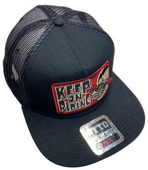 Flat Bill Cap with mesh back. Front has a red embroidered patch that says "Keep on Riding" and has a "Bobber Monster" graphic. Structured top to keep its shape. Sold at our shop just outside Nashville in Smyrna, TN.