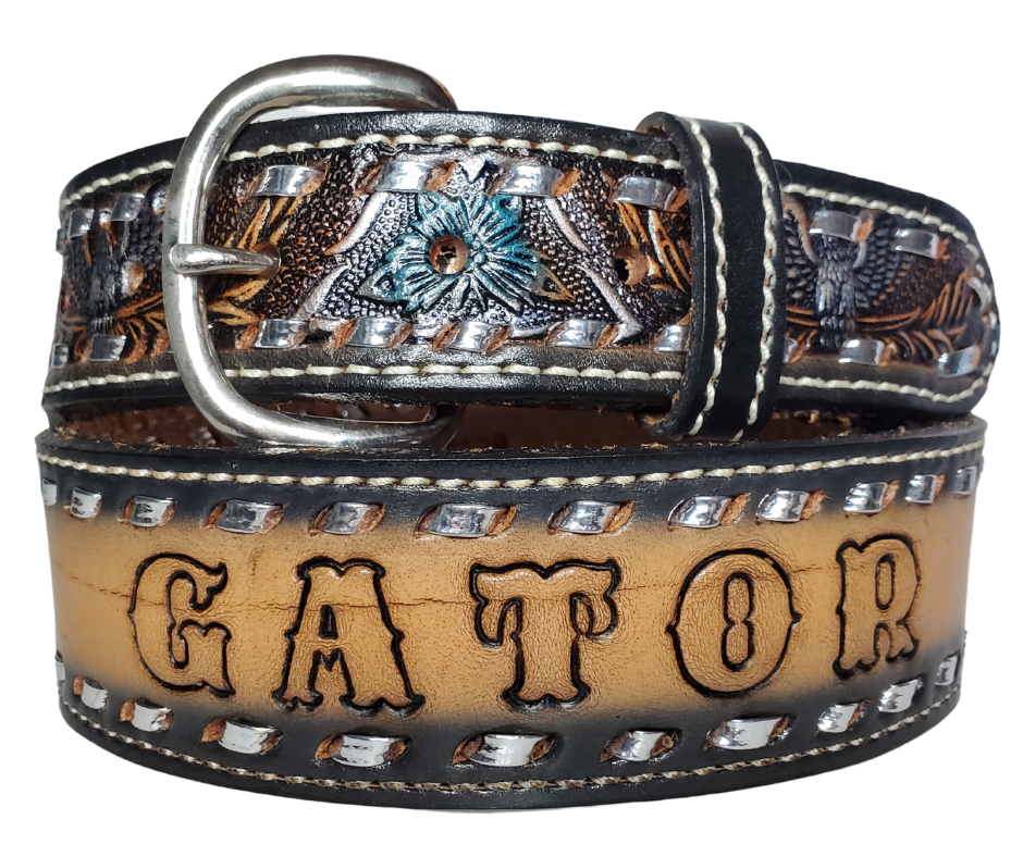 The Honky Tonk leather belt is a classic Vintage Throwback Style Western belt. Complete with silver Buck Stitching and a embossed eagle design in Black/Silver/Blue coloring. Available in a 1 1/2" width tapering up to 1 3/4" wide. Full grain vegetable tanned cowhide, Width 1 1/2" and includes Nickle plated  buckle Smooth burnished painted edges. Made in USA!   In stock at our Smyrna, TN shop.