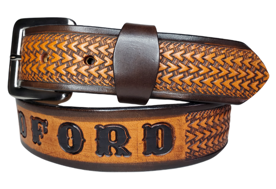"The Wayfarer" is a handmade real leather belt made from a single strip of cowhide shoulder leather that is 8-10 oz. or approx. 1/8" thick. It has hand burnished (smoothed) edges and a Triple Arrow pattern. This belt is completely HAND dyed with a multi step finishing technic. The antique nickel plated solid brass buckle is snapped in place with heavy snaps.  This belt is made just outside Nashville in Smyrna, TN.
