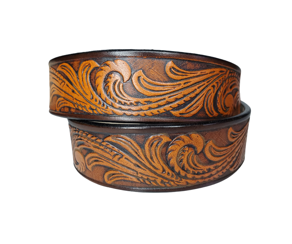 Our Lil Rustler is just like the Rustler for dad or mom. Full grain American vegetable tanned cowhide approx. 1/8"thick. Width is 1 1/4" and includes Antique Nickle plated Solid Brass buckle. We Hand Finished with a darker brown edge feathered into a tan center. Edges are smooth burnished painted edges. Made in our Smyrna, TN, USA shop.