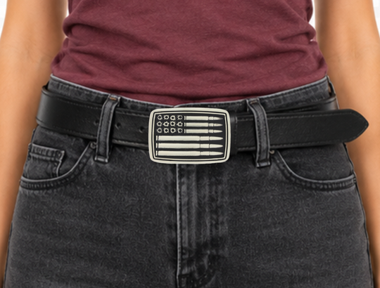 A deeply antiqued silver tone rectangular Attitude buckle with a overall flag design but instead of stars and stripes there are bullet holes and bullets. Standard 1.5 inch belt swivel. Available online and at our shop just outside Nashville in Smyrna, TN.